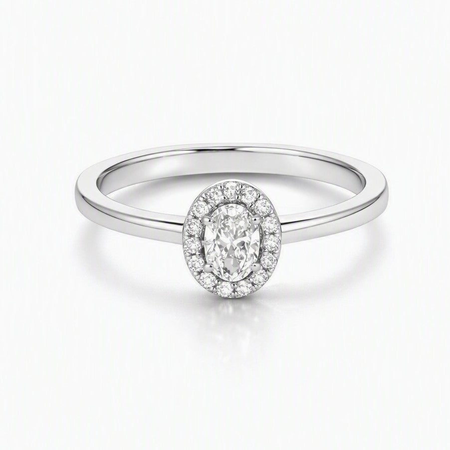 9ct White Gold Oval Diamond Halo Ring. Design No: DRG1110