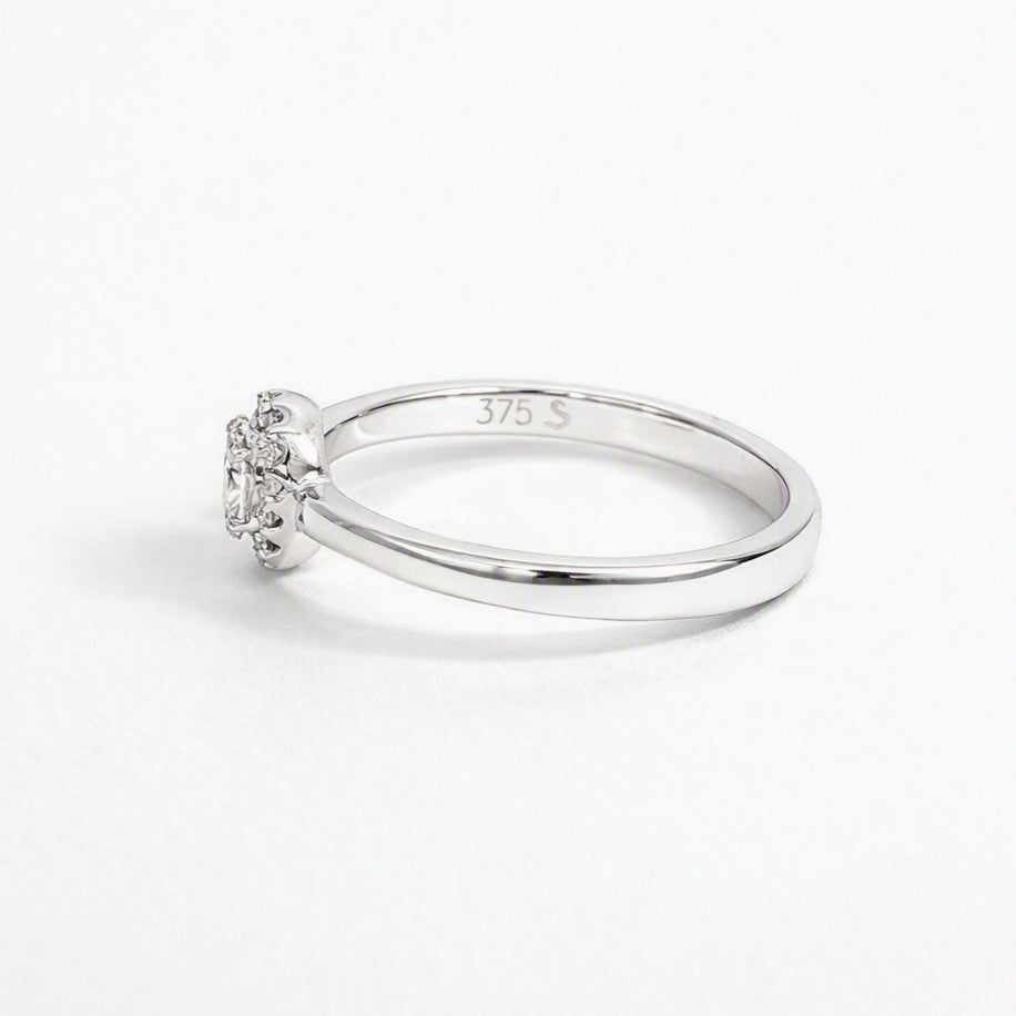 9ct White Gold Oval Diamond Halo Ring. Design No: DRG1110